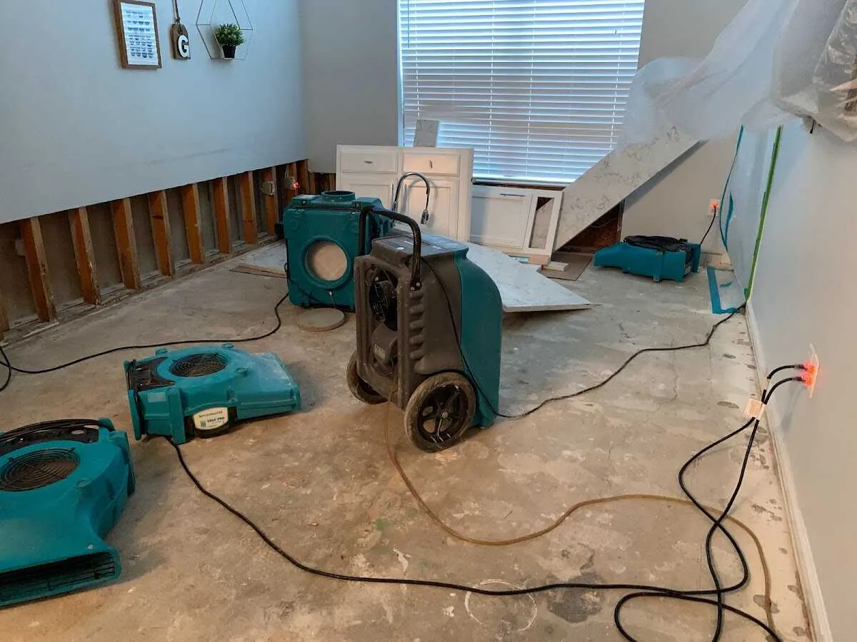 Dehumidifier in flood-cut room for Water Damage Restoration in Luzerne